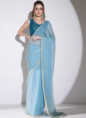 Garb These Party Wear Ready To Wear Saree in Fine Colored.These Saree Are Tissue And Blouse is Silk Blend Fabricated.Its Beautified With Solid With Heavy Lace Border Designer.
