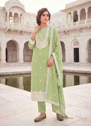 Garb These Suit in Fine Colored Pair With Bottom And Dupatta.These Top And Dupatta Are Fabricated On Organza Pair With Jam Satin Bottom.Its Beautified With Woven Designer With Embroidery, Hand Work.