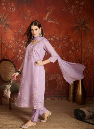 Garb These Suit in Fine Colored Pair With Bottom And Dupatta.These Top Are Mul Chanderi And Bottom Are Fabricated On Roman Silk Pair With Mul Chanderi Dupatta.Its Beautified With Designer Embroidery Work.