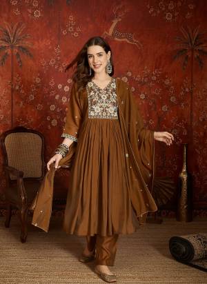 Garb These Suit in Fine Colored Pair With Bottom And Dupatta.These Top Are Mul Chanderi And Bottom Are Fabricated On Roman Silk Pair With Mul Chanderi Dupatta.Its Beautified With Designer Embroidery Work.