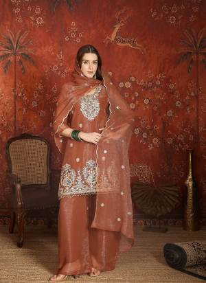 Garb These Suit in Fine Colored Pair With Bottom And Dupatta.These Top Are Simmer Lining Jari And Bottom Are Fabricated On Simmer Lining Jari Pair With Simmer Lining Jari Dupatta.Its Beautified With Designer Embroidery Work.