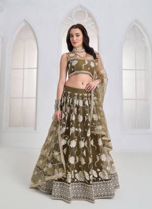 For A Different Look,Grab These Party Wear Designer Lehenga in All Over Pretty Colored Pair With Blouse And Dupatta.These Lehenga Choli And Dupatta is All Over Butterfly Net Base Fabric With Designer Tone To Tone Thread,Sandwitch Sequance,Coding Dori Embroidery Work.