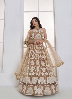 For A Different Look,Grab These Party Wear Designer Lehenga in All Over Pretty Colored Pair With Blouse And Dupatta.These Lehenga Choli And Dupatta is All Over Butterfly Net Base Fabric With Designer Tone To Tone Thread,Sandwitch Sequance,Coding Dori Embroidery Work.