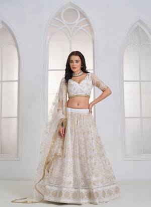 For A Different Look,Grab These Party Wear Designer Lehenga in All Over Pretty Colored Pair With Blouse And Dupatta.These Lehenga Choli And Dupatta is All Over Butterfly Net Base Fabric With Designer Tone To Tone Thread,Sandwitch Sequance,Coding Dori Embroidery Work.