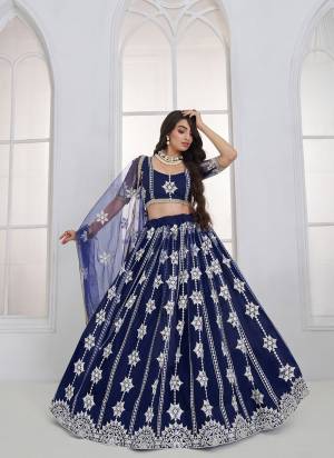 For A Different Look,Grab These Party Wear Designer Lehenga in All Over Pretty Colored Pair With Blouse And Dupatta.These Lehenga Choli And Dupatta is All Over Butterfly Net Base Fabric With Designer Tone To Tone Thread,Sandwitch Sequance,Coding Dori Embroidery Work.
