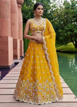 Attrective Looking This Party Wear Fine Color Fancy Heavy Designer Choli And Lahenga Fabriced On Tissue And Dupatta Tissue In Fabricated Beautified With Attrective Designer Sequance,Beads Embroidery Work. Buy Now.