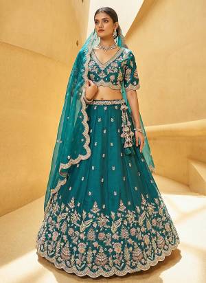 Attrective Looking This Party Wear Fine Color Fancy Heavy Designer Choli And Lahenga Fabriced On Tissue And Dupatta Tissue In Fabricated Beautified With Attrective Designer Sequance,Beads Embroidery Work. Buy Now.