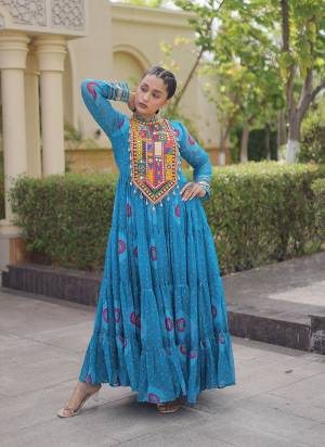 Garb These Beautiful Looking Navratri Readymade Long Gown.These Gown Are Faux Georgette Fabricated.Its Beautified With Bandhani Printed With Kutchi Patch Work.