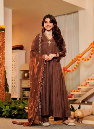 Garb These Suit in Fine Colored Pair With Bottom And Dupatta.These Top Are CP Vichitra And Bottom Are Fabricated On CP Vichitra Pair With CP Vichitra Dupatta.Its Beautified With Designer Embroidery Work.
