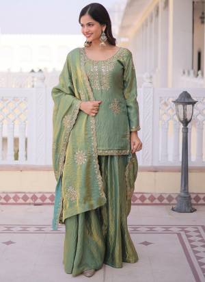 Garb These Suit in Fine Colored Pair With Bottom And Dupatta.These Top Are CP Vichitra And Bottom Are Fabricated On CP Vichitra Pair With CP Vichitra Dupatta.Its Beautified With Designer Embroidery Work.