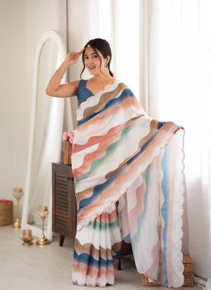 Attractive These Party Wear Saree in Fine Colored.These Saree Are Chinon And Blouse is Chinon Fabricated.Its Beautified With Designer Digital Printed With Mirror Cut Work Border.