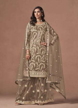 Looking These Beautiful Party Wear Fine Color Plazzo Suits.These Top Are Net And Dupatta Are Net And Bottom Net Fabricated.Its Beautified With Heavy Designer Embroidery Work.
