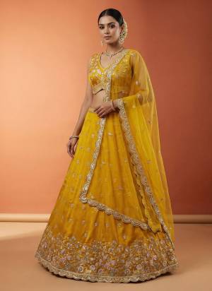 Garb This Party Wear Fine Color Fancy Heavy Designer Choli And Lahenga Fabriced On Chinon Silk And Dupatta Net In Fabricated Beautified With Attrective Designer Sequance,Moti Embroidery Work. Buy Now.