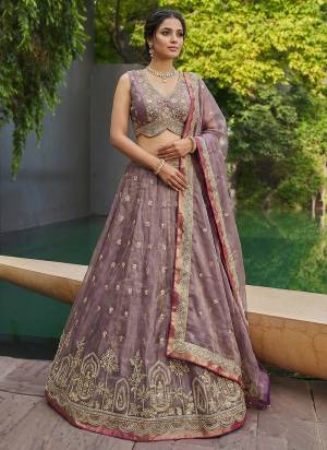 Garb This Party Wear Fine Color Fancy Heavy Designer Choli And Lahenga Fabriced On Tissue And Dupatta Tissue In Fabricated Beautified With Attrective Designer Sequance,Moti Embroidery Work. Buy Now.