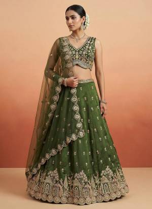 Garb This Party Wear Fine Color Fancy Heavy Designer Choli And Lahenga Fabriced On Chinon Silk And Dupatta Net In Fabricated Beautified With Attrective Designer Sequance,Moti Embroidery Work. Buy Now.