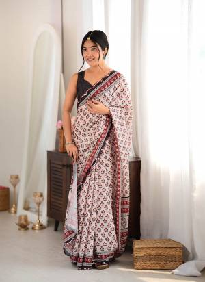 Looking These Party Wear Saree in Fine Colored.These Saree Are Chinon And Blouse is Chinon Fabricated.Its Beautified With Designer Digital Printed With Mirror Cut Work Border.