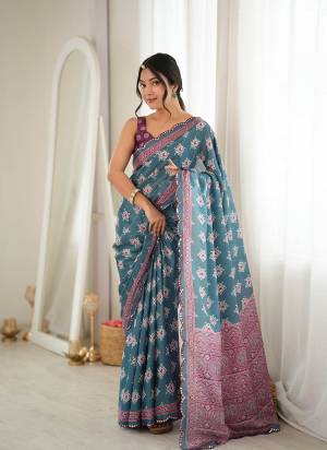 Looking These Party Wear Saree in Fine Colored.These Saree Are Chinon And Blouse is Chinon Fabricated.Its Beautified With Designer Digital Printed With Mirror Cut Work Border.