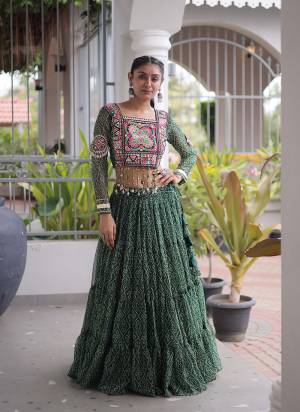 Looking These Navratri Wear Lehenga Choli in Fine Colored. These Lehenga Are Faux Georgette And Blouse Are Faux Georgette Fabricated. It is Beautified With Designer Bandhani Printed With Kutchi Patch Work.