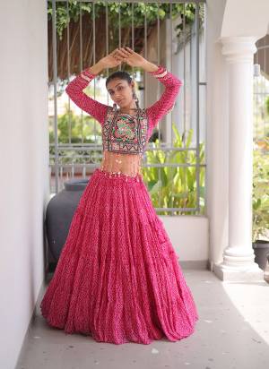 Looking These Navratri Wear Lehenga Choli in Fine Colored. These Lehenga Are Faux Georgette And Blouse Are Faux Georgette Fabricated. It is Beautified With Designer Bandhani Printed With Kutchi Patch Work.