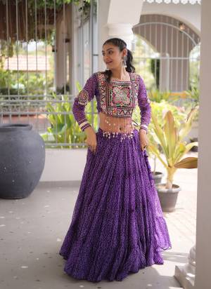 Looking These Navratri Wear Lehenga Choli in Fine Colored. These Lehenga Are Faux Georgette And Blouse Are Faux Georgette Fabricated. It is Beautified With Designer Bandhani Printed With Kutchi Patch Work.