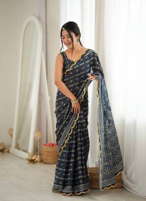 Looking These Party Wear Saree in Fine Colored.These Saree Are Chinon And Blouse is Chinon Fabricated.Its Beautified With Designer Digital Printed With Mirror Cut Work Border.
