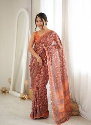 Looking These Party Wear Saree in Fine Colored.These Saree Are Chinon And Blouse is Chinon Fabricated.Its Beautified With Designer Digital Printed With Mirror Cut Work Border.