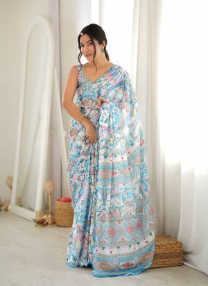 Looking These Party Wear Saree in Fine Colored.These Saree Are Chinon And Blouse is Chinon Fabricated.Its Beautified With Designer Digital Printed With Mirror Cut Work Border.