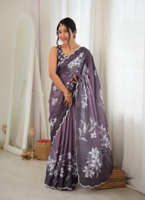 Looking These Party Wear Saree in Fine Colored.These Saree Are Chinon And Blouse is Chinon Fabricated.Its Beautified With Designer Digital Printed With Mirror Cut Work Border.