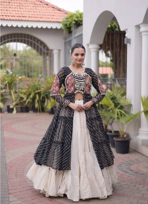 Looking These Navratri Wear Lehenga Kurti in Fine Colored. These Lehenga Are Kora Cotton And Kurti Are Faux Georgette Fabricated. It is Beautified With Lahariya Printed With Designer Kutchi Patch Work.