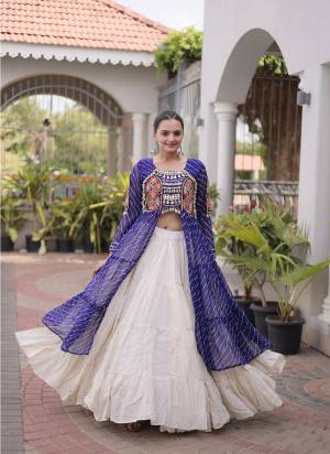 Looking These Navratri Wear Lehenga Kurti in Fine Colored. These Lehenga Are Kora Cotton And Kurti Are Faux Georgette Fabricated. It is Beautified With Lahariya Printed With Designer Kutchi Patch Work.
