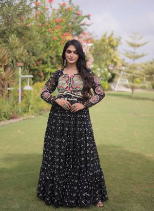 Garb These Beautiful Looking Navratri Readymade Long Gown.These Gown Are Faux Georgette Fabricated.Its Beautified With Bandhani Printed With Kutchi Patch Work.
