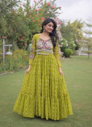 Garb These Beautiful Looking Navratri Readymade Long Gown.These Gown Are Faux Georgette Fabricated.Its Beautified With Bandhani Printed With Kutchi Patch Work.
