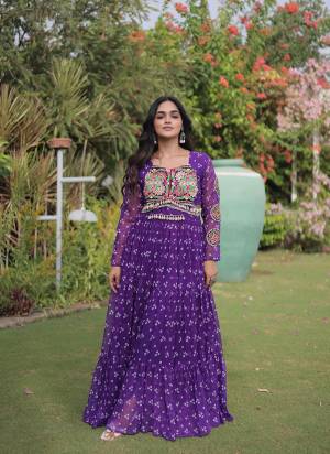 Garb These Beautiful Looking Navratri Readymade Long Gown.These Gown Are Faux Georgette Fabricated.Its Beautified With Bandhani Printed With Kutchi Patch Work.