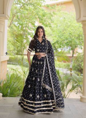 Looking These Beautiful Looking Navratri Wear Free Size Stitched Lahenga Choli With Dupatta.These Lahenga Are Faux Georgette And Blouse is Fabricated On Faux Georgette And Faux Georgette Dupatta.Its Beautified With Designer Bandhej Printed With Sequance,Jari,Gota Embroidery Work.