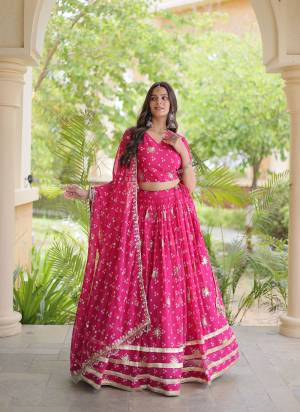 Looking These Beautiful Looking Navratri Wear Free Size Stitched Lahenga Choli With Dupatta.These Lahenga Are Faux Georgette And Blouse is Fabricated On Faux Georgette And Faux Georgette Dupatta.Its Beautified With Designer Bandhej Printed With Sequance,Jari,Gota Embroidery Work.