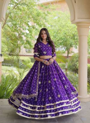 Looking These Beautiful Looking Navratri Wear Free Size Stitched Lahenga Choli With Dupatta.These Lahenga Are Faux Georgette And Blouse is Fabricated On Faux Georgette And Faux Georgette Dupatta.Its Beautified With Designer Bandhej Printed With Sequance,Jari,Gota Embroidery Work.