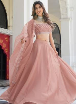 For A Fancy Designer Look,Grab These Lehenga Choli With Dupatta in Fine Colored.These Lehenga And Choli Are Organza And Dupatta Are Fabricated On Organza Pair.Its Beautified With Solid Designer, Embroidery Work.