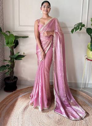 Attractive These Fancy Party Wear Saree in Fine Pedding Colored.These Saree Are Fendy Satin And Blouse is Fendy Satin Fabricated.Its Beautified With Two Tone Color,Sequance Hand Work Border Lace.