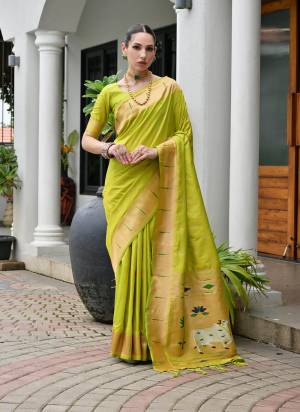 Attractive These Festive And Party Wear Saree in Fine Colored.These Saree And Blouse is Fabricated On Banarasi Silk.Its Beautified With Traditional Paithani Pichwai Pallu Woven Designer.