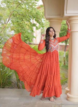 Garb These Beautiful Looking Navratri Readymade Long Gown.These Gown Are Faux Georgette Fabricated.Its Beautified With Bandhani Printed With Kutchi Patch Work.
