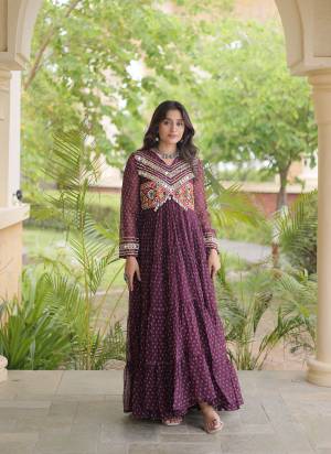 Garb These Beautiful Looking Navratri Readymade Long Gown.These Gown Are Faux Georgette Fabricated.Its Beautified With Bandhani Printed With Kutchi Patch Work.