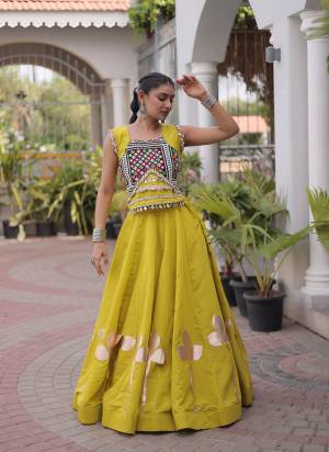Looking These Beautiful Looking Navratri Wear Free Size Stitched Lahenga Choli.These Lahenga Are Roman Silk And Blouse is Fabricated On Roman Silk.Its Beautified With Designer Pan Gota Patti,Mirror Gamthi Work.