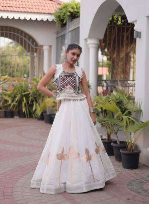 Looking These Beautiful Looking Navratri Wear Free Size Stitched Lahenga Choli.These Lahenga Are Roman Silk And Blouse is Fabricated On Roman Silk.Its Beautified With Designer Pan Gota Patti,Mirror Gamthi Work.