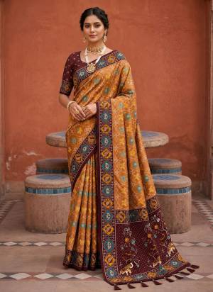 Attractive These Party Wear Saree in Fine Colored.These Saree Are Patola Silk And Blouse is Fabricated On Patola Silk.Its Beautified With Weaving Jacquard Meenakari Designer.