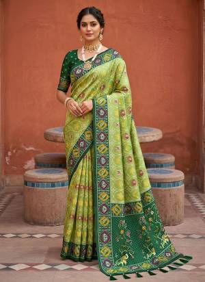 Attractive These Party Wear Saree in Fine Colored.These Saree Are Patola Silk And Blouse is Fabricated On Patola Silk.Its Beautified With Weaving Jacquard Meenakari Designer.