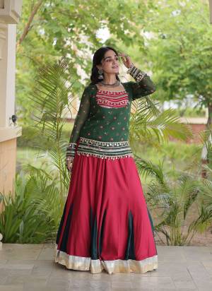 Looking These Navratri Wear Lehenga Choli With Jacket in Fine Colored. These Lehenga Are Rayon And Blouse Are Rayon Fabricated And Faux Georgette Jacket. It is Beautified With Designer Bandhani Printed With Kutchi Gamthi Lace Work.
