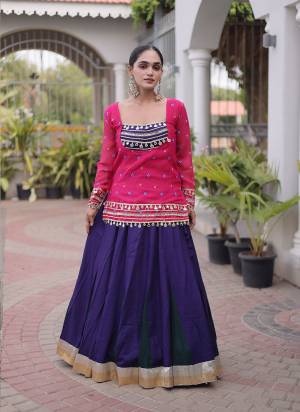 Looking These Navratri Wear Lehenga Choli With Jacket in Fine Colored. These Lehenga Are Rayon And Blouse Are Rayon Fabricated And Faux Georgette Jacket. It is Beautified With Designer Bandhani Printed With Kutchi Gamthi Lace Work.