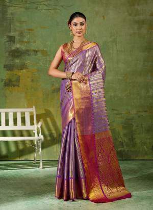 Garb These Fastive And Party Wear Saree in Fine Colored.These Saree And Blouse is Fabricated On Kanjivaram Silk.Its Beautified With Weaving Jari Designer.