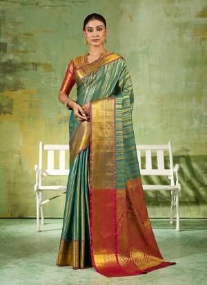 Garb These Fastive And Party Wear Saree in Fine Colored.These Saree And Blouse is Fabricated On Kanjivaram Silk.Its Beautified With Weaving Jari Designer.