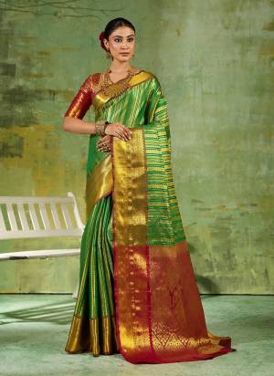 Garb These Fastive And Party Wear Saree in Fine Colored.These Saree And Blouse is Fabricated On Kanjivaram Silk.Its Beautified With Weaving Jari Designer.
